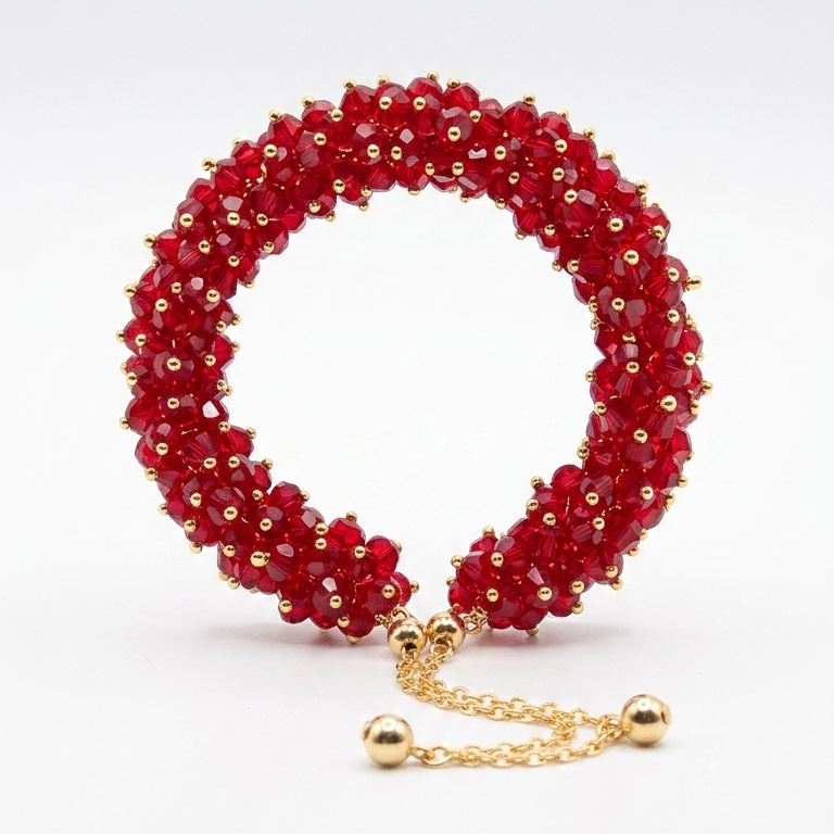Red beaded bracelet with gold chain